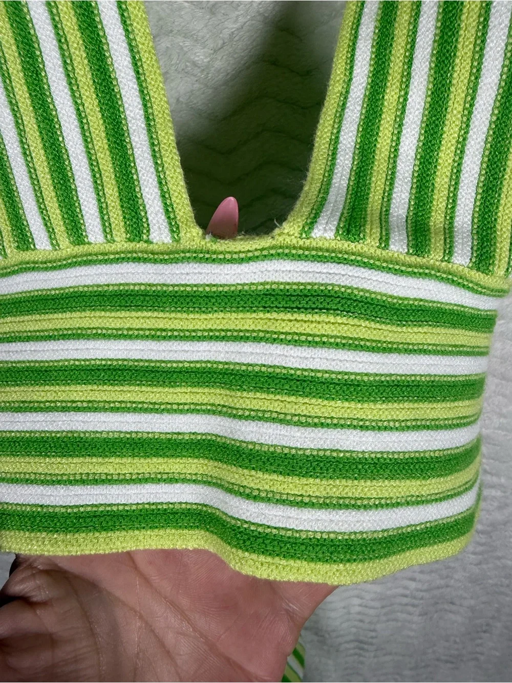 Cider striped halter top features a distinctive tie-back design vibrant green